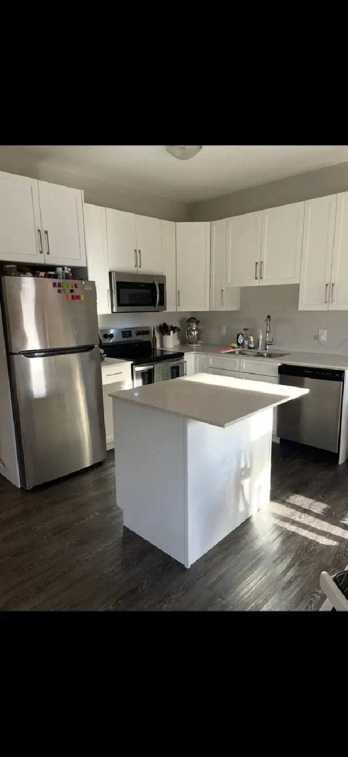 NEWER 4 Bedroom Duplex with Garage for Rent in Kleefeld!
