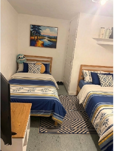 Furnished basement room $750/month.