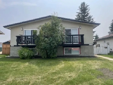 Renovated 3 Bedroom Duplex - Fenced Yard & Two Parking Stall