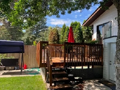BEAUTIFUL 3 BEDROOM 2 BATH 2 YARDS WITH LARGE GARAGE BY RIVER