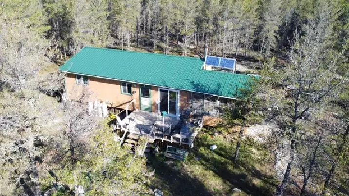 WORLD-CLASS FISHING • WATERFRONT WILDERNESS • FOUR-SEASON RETREA