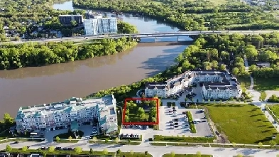 Rare Opportunity to Invest in a 120' x 167' Riverfront Lot!
