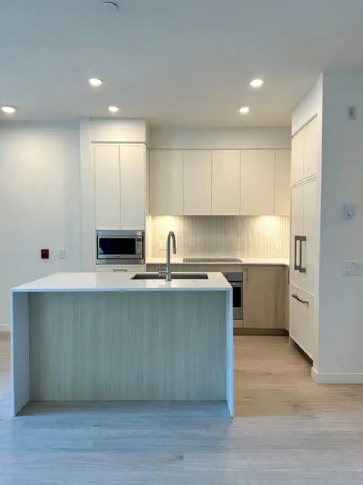 Brand New 2 Bed / 2 Bath Garden Level Townhome