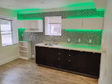 3 1/2 24E Ave, Grand Demi Sous-Sol à louer