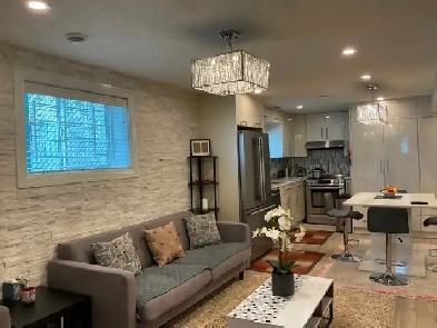Fully renovated and furnished 2 bdr sep entr & laundry bsm suite