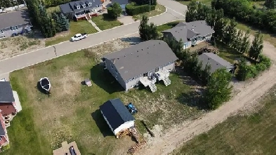 Real Estate Auction: 12-Bedroom Duplex - Kerrobert, SK