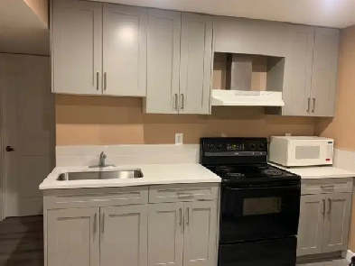 Spacious basement Room in Banff Trail close to UC/SAIT
