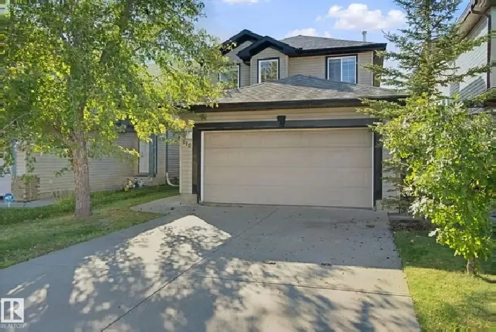 Ellerslie 4 Bed Home Backing Green Belt with Massive Deck
