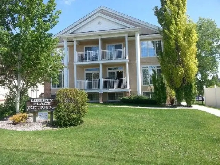 Spacious 2 Bed Apt with Covered Parking - Small Pet Friendly!