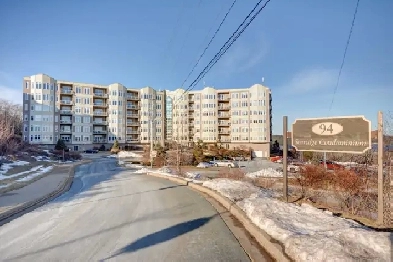26-099 Large condo with water views from every room