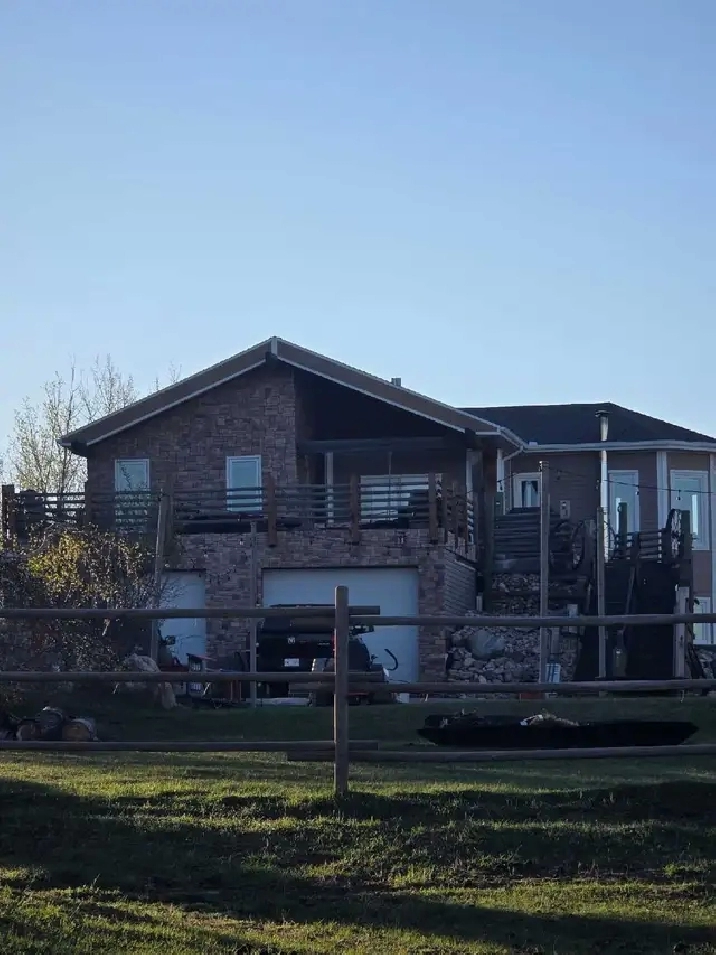 GORGEOUS Raised Bungalow on 40 Acres