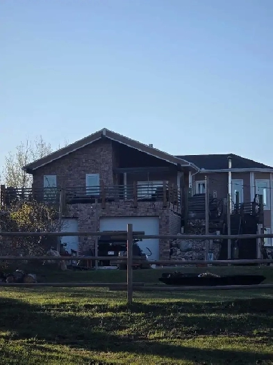 GORGEOUS Raised Bungalow on 40 Acres