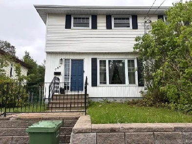 Spacious 3-bedroom duplex with yard, deck and driveway parking