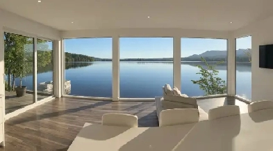 Chalet neuf directement au bord de l'eau à Eastman.