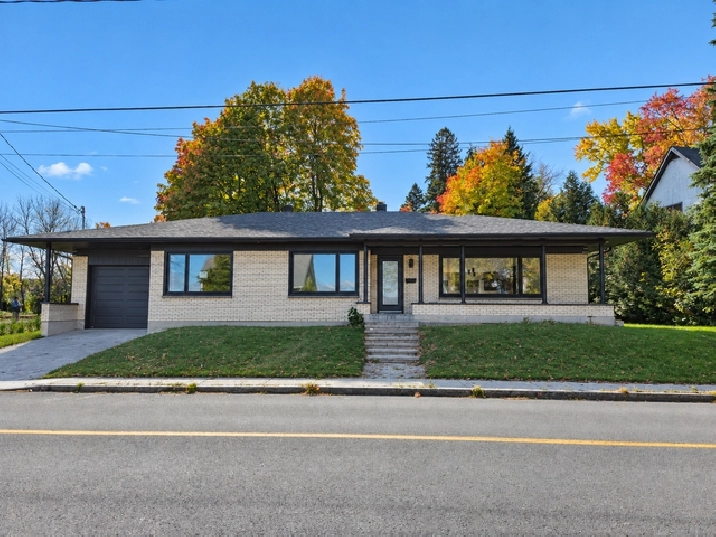 À VENDRE À LÉVIS — PLAIN-PIED LUMINEUX AVEC GARAGE ET VUE PARTIE