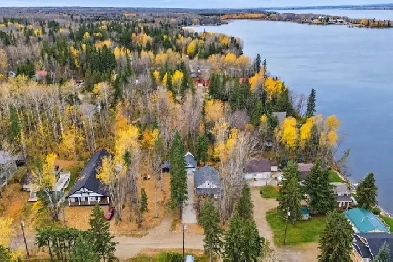0.169 Acre Isle Lake Lot with Lake View 2 Bed Home and Dock