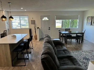 # Beautiful Furnished 2-Bedroom Upper Suite with Modern Kitchen