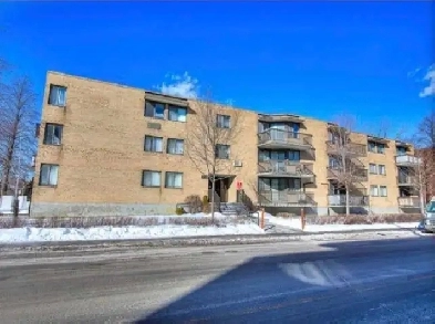 condo 3 1/2 with an indoor garage