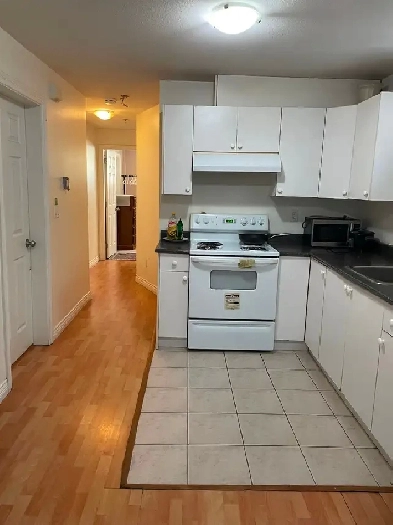 Bright private furnished BR in 2 BR bsmt suite by Joyce Station