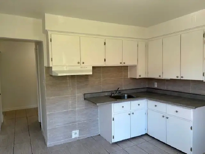 Grand Logement 4½ au rez-de-chaussée